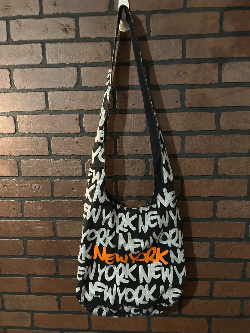 Robin Ruth Black Shoulder Bag with White and Orange New York Print